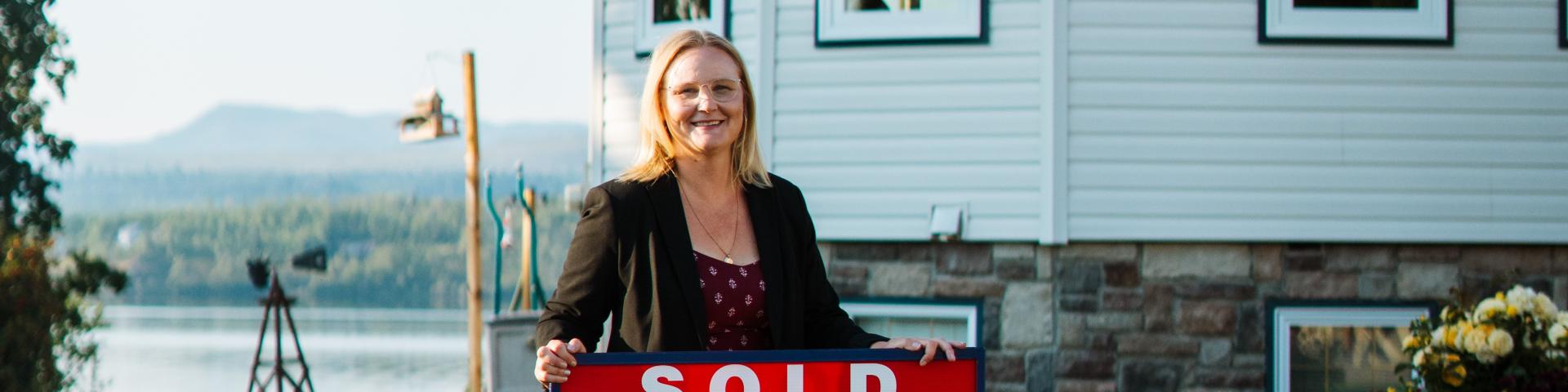 Sold Sign with Realtor