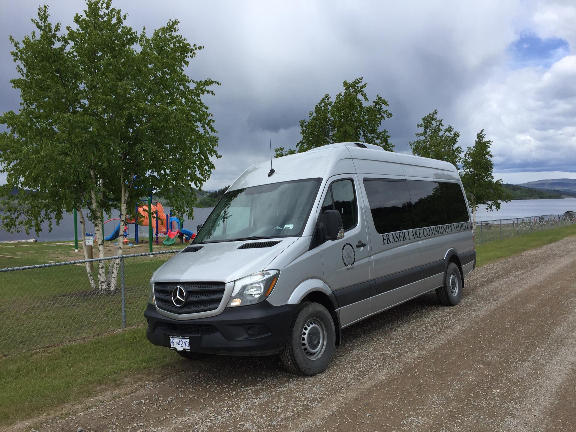 Bus in front of White Swan Park playground.